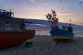 Fishing boats on the beach at sunset: Baltic Sea, Western Pomerania, Poland, Europe Royalty Free Stock Photo