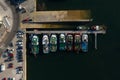 Fishing boats at the berths in the seaport, aerial view