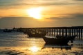 Fishing boats and bridge at sunset, Bang Phra beach, Chonburi Royalty Free Stock Photo