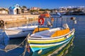 Fishing boats on the coastline of Kato Galatas town on Crete, Greece Royalty Free Stock Photo