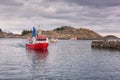 Fishing village Henningsvaer in Lofoten Islands, Northern Norway in cod skrei season Royalty Free Stock Photo