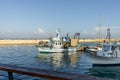 Fishing boats coming into the Jaffa - Namal Yafo port in Tel Aviv, Israel. Jaffa