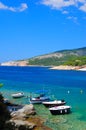 Fishing boats in a cove in Thassos island, Greece