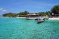 Fishing boats on crystal clear turquoise water Royalty Free Stock Photo