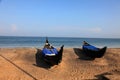 Fishing boats docked on a beach