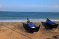 Fishing boats docked on a beach