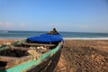 Fishing boats docked on a beach