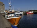 Fishing boats docked in the harbor