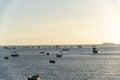 Fishing boats anchored in the sea under the strong sun of the day Royalty Free Stock Photo