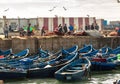 Fishing Boats and fishermen in the harbor in Essaouira, Morocco Royalty Free Stock Photo