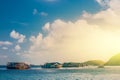 Fishing boats floating on sunrise blue sea