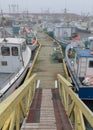 Fishing boats in foggy harbor of Saint Bride`s