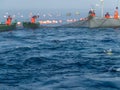 Fishing boats with hanging nets and buoys Royalty Free Stock Photo