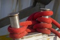 Fishing boats in harbor - bollard with red rope Royalty Free Stock Photo
