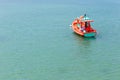 Fishing Boats in a Harbor fishing boat on bay with sea background .