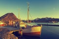 Fishing boats in harbor at midnight sun in Northern Norway, Lofoten Island, Ramberg, Norway Royalty Free Stock Photo