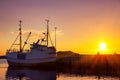 Fishing boats in harbor at midnight sun in Northern Norway, Lofoten Island, Ramberg, Norway Royalty Free Stock Photo