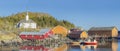 The Typical Norwegian fishing village of Moskenes under midnight sun Royalty Free Stock Photo