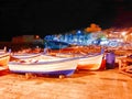 Fishing boats in harbor at night Royalty Free Stock Photo