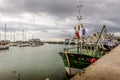 Fishing boats in the harbor stopped their work because of the corona covid 19 outbreak