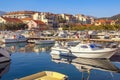 Fishing boats in harbor. Marina Kalimanj in Tivat city on sunny winter day. Montenegro Royalty Free Stock Photo