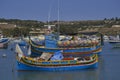 Fishing boats in the harbour of Marsaxlokk in Malta Royalty Free Stock Photo