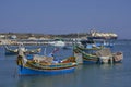 Fishing boats in the harbour of Marsaxlokk in Malta Royalty Free Stock Photo