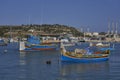 Fishing boats in the harbour of Marsaxlokk in Malta Royalty Free Stock Photo