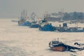 Fishing boats in the ice of a frozen bay Royalty Free Stock Photo