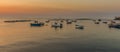 Fishing boats inside the calm of the breakwater at Aspra Sicily at sunset