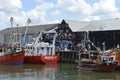 Fishing boats line the harbour during the Whitstable Oyster Festival Royalty Free Stock Photo