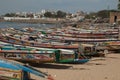 Fishing boats and a man sleeping on one of them. Royalty Free Stock Photo