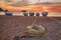 Fishing boats on the Mediterranean coast at sunrise background