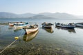 Fishing boats along the shore of Lake Bafa in Turkey
