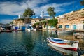 Fishing boats in harbour in fishing village of Mandrakia, Milos island, Greece Royalty Free Stock Photo