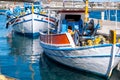 Fishing boat anchored at Milos island harbor. Greece Royalty Free Stock Photo