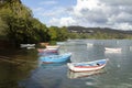 Fishing boats moored in a peaceful estuary  northern Galicia  Spain Royalty Free Stock Photo