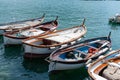 Fishing boats moored together on coast of Italian fishing village Royalty Free Stock Photo