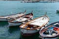 Fishing boats moored together on coast of Italian fishing village Royalty Free Stock Photo