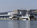 Fishing boats moored on a wharf