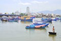 Fishing boats are mooring in a pier in the Cai river of Nha Trang city Royalty Free Stock Photo