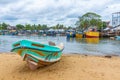 Fishing boats mooring at the shore of Negombo lagoon in Sri Lank