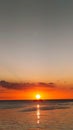 Fishing boats pass by at sunset, the sunset view is so beautiful