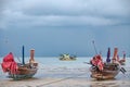 Fishing boats on the Patong beach waiting for high tide in Phuket, Thailand Royalty Free Stock Photo