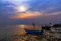 The fishing boats on pebble beach and twilight Royalty Free Stock Photo