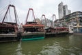 Fishing boats are at the pier at the fishing port in Macau.