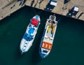 fishing boats at pier top view from the throne, Simi island Greece Europe. bright Sunny day, colorful boats as postcards