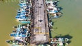 Fishing boats in the port of Mazara del Vallo in Sicily, aerial overhead view from drone