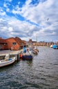 Fishing boats in the port of Wismar with a seagull in the sky