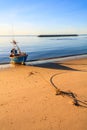 Fishing boats protected by breakwater Royalty Free Stock Photo